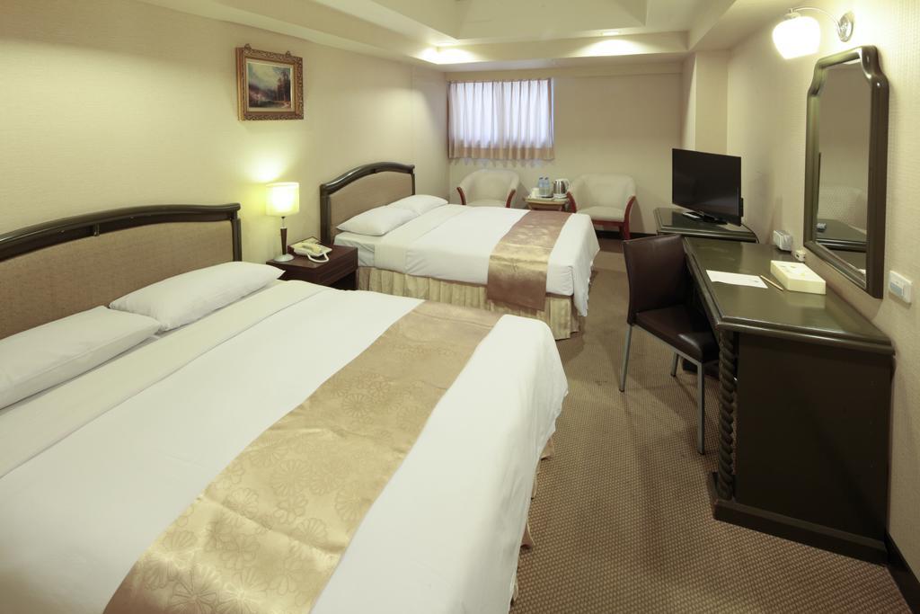 Lincoln Hotel Tainan Quarto foto